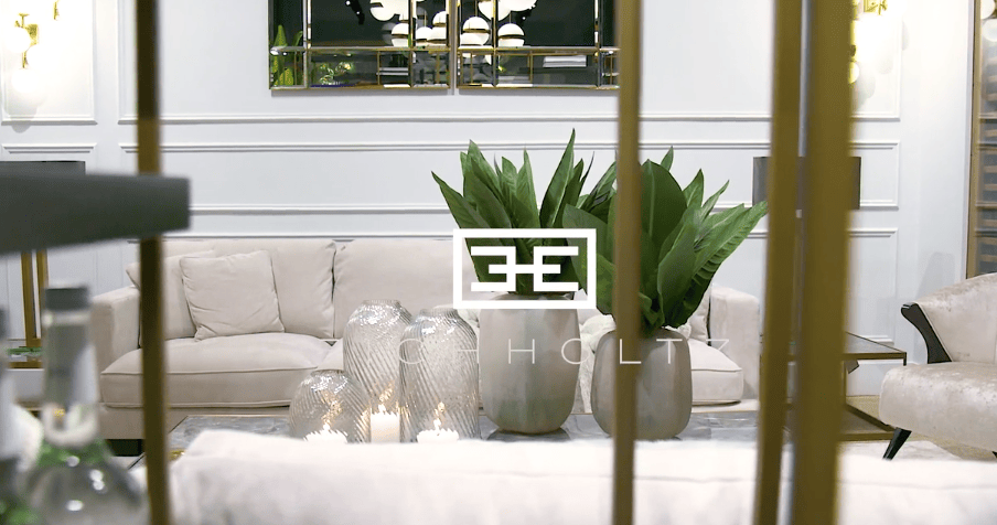Elegant living room decor viewed through golden bars