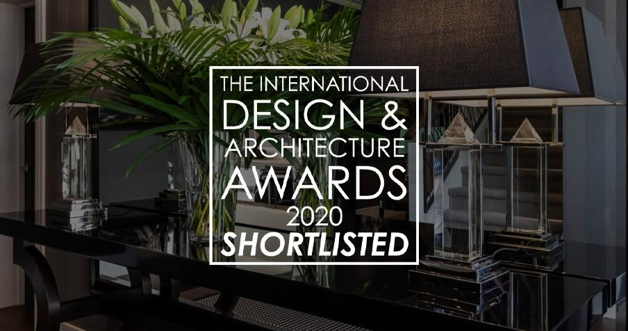 Design awards and trophy display on elegant table