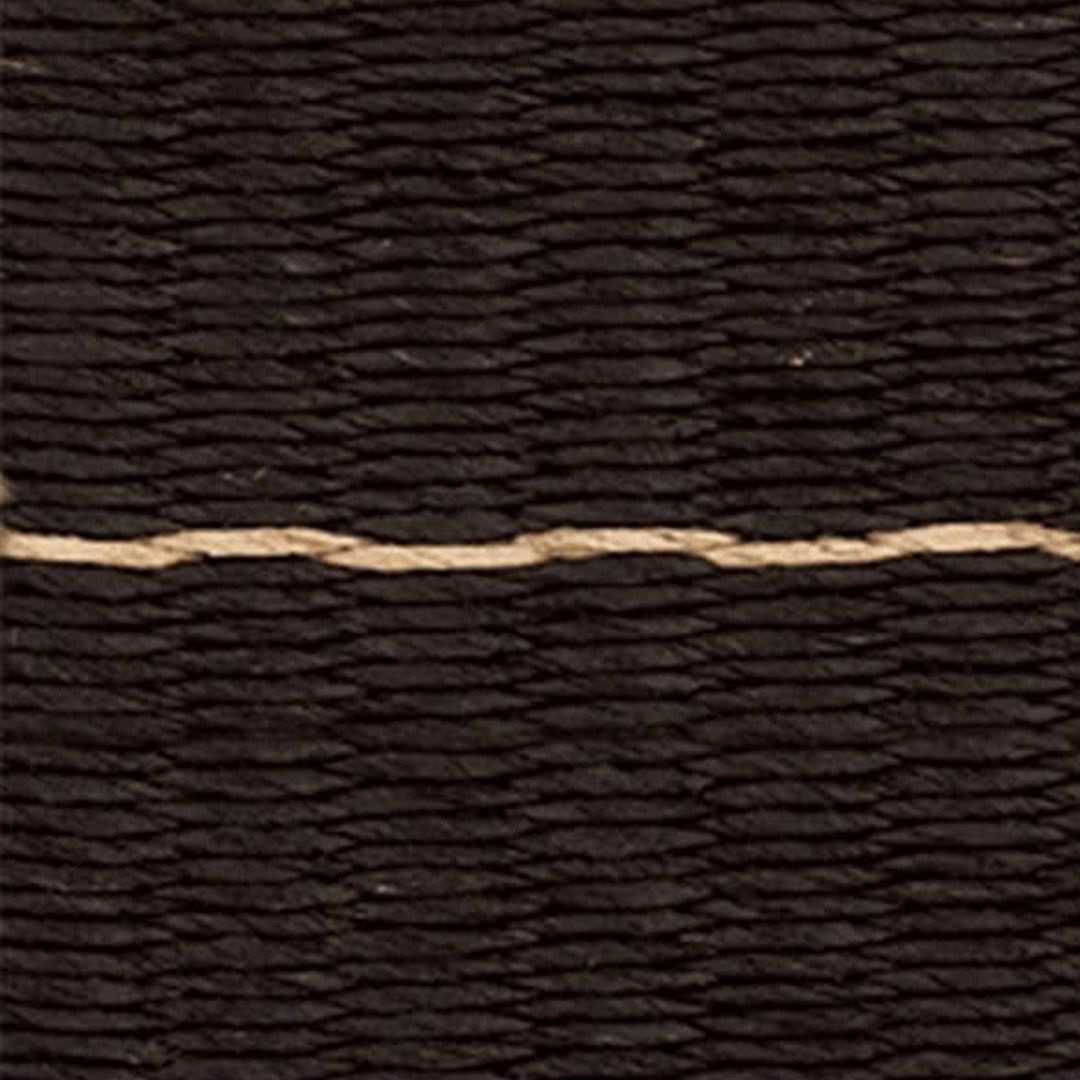 Close-up of textured black fabric with horizontal line