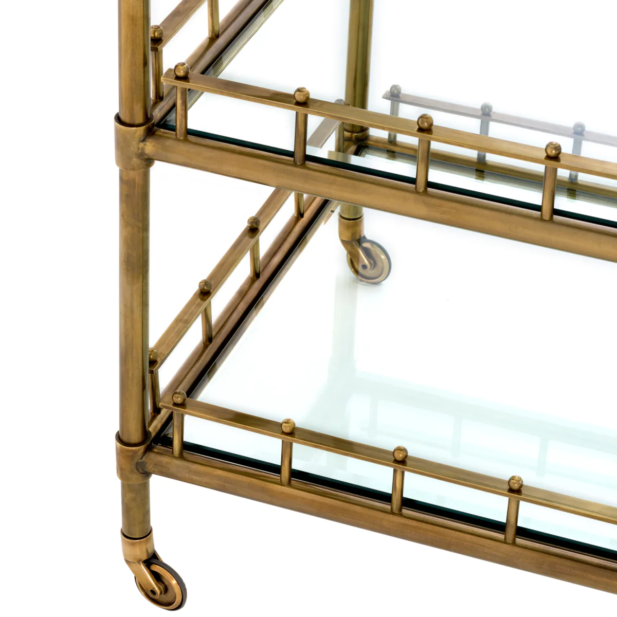 Brass bar cart with glass shelves and caster wheels