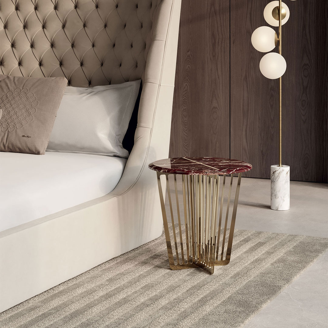 Elegant bedroom with tufted headboard and modern side table