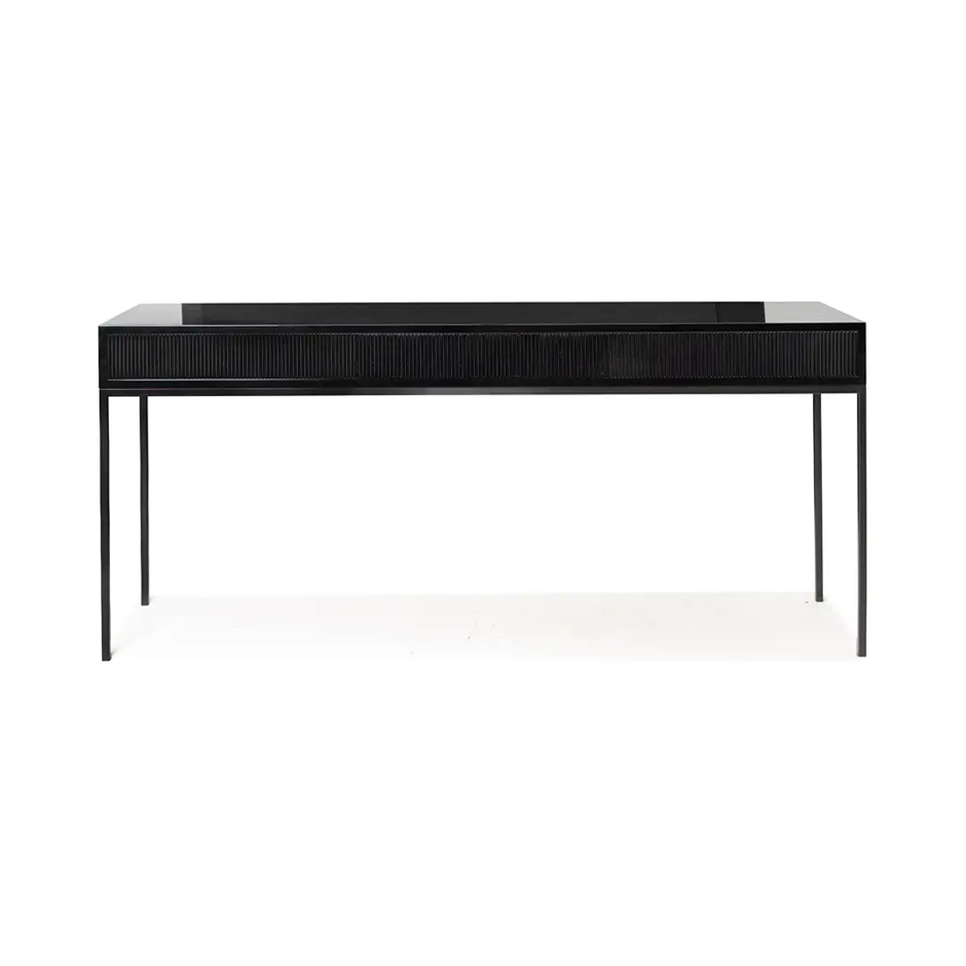 Black modern desk with textured drawers on white background