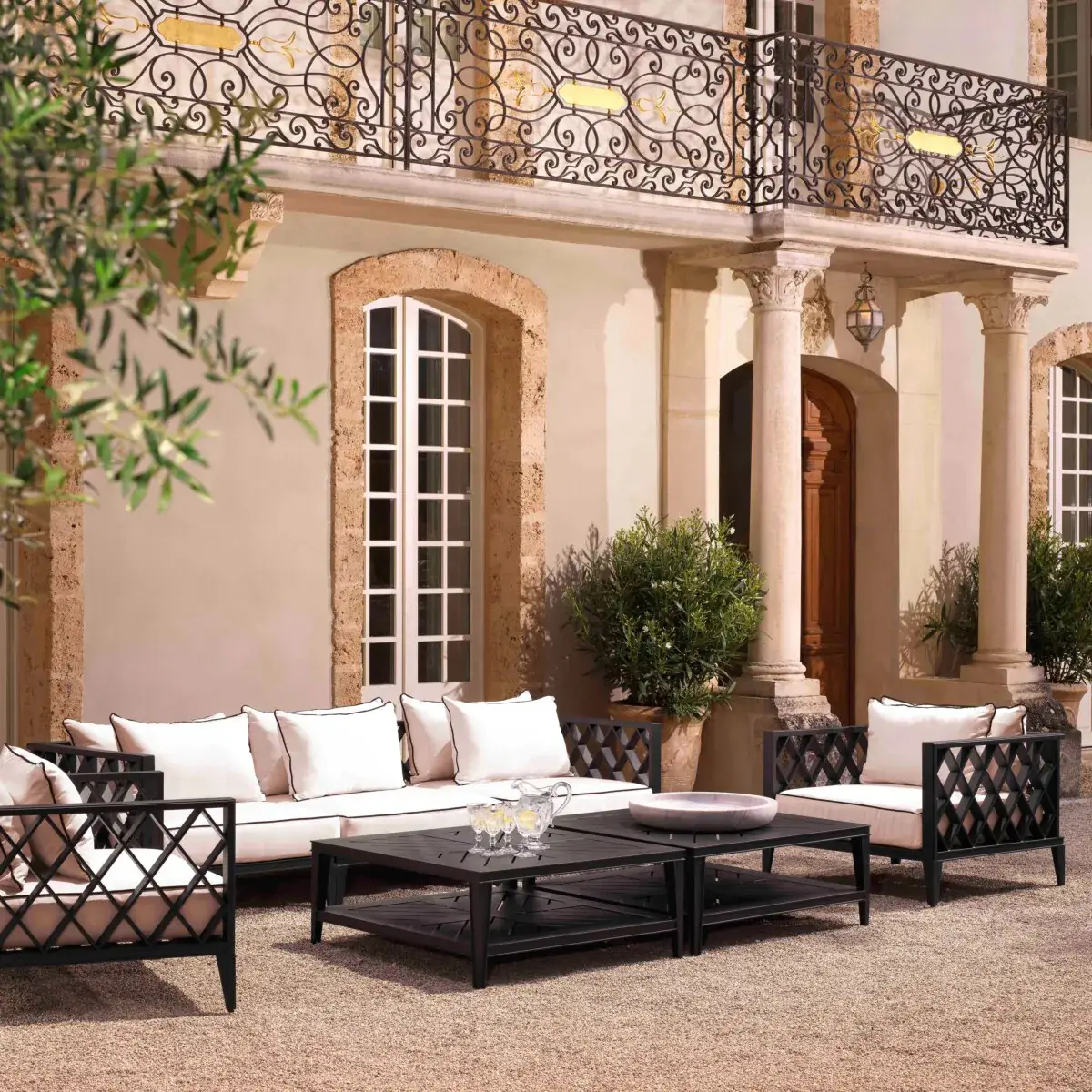 Elegant patio with furniture and Mediterranean architecture