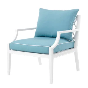Modern white armchair with blue cushions