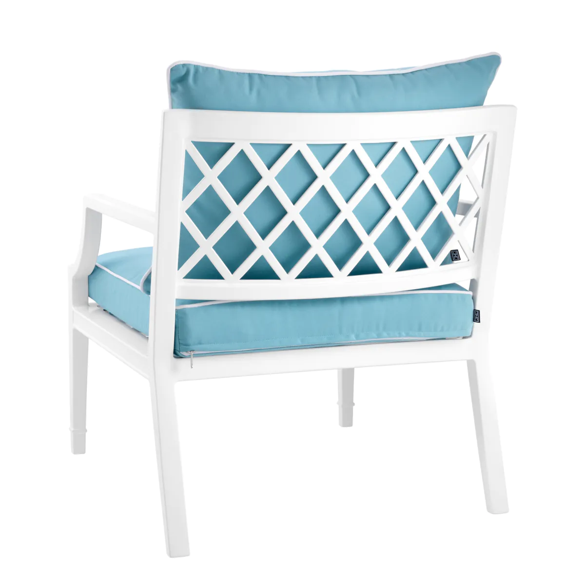White chair with blue cushions and lattice back.