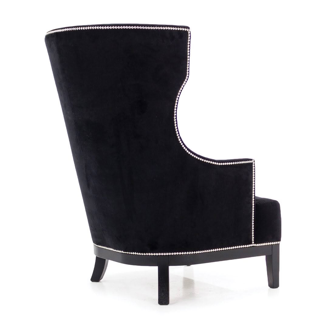 Elegant black velvet high-back chair with silver studs