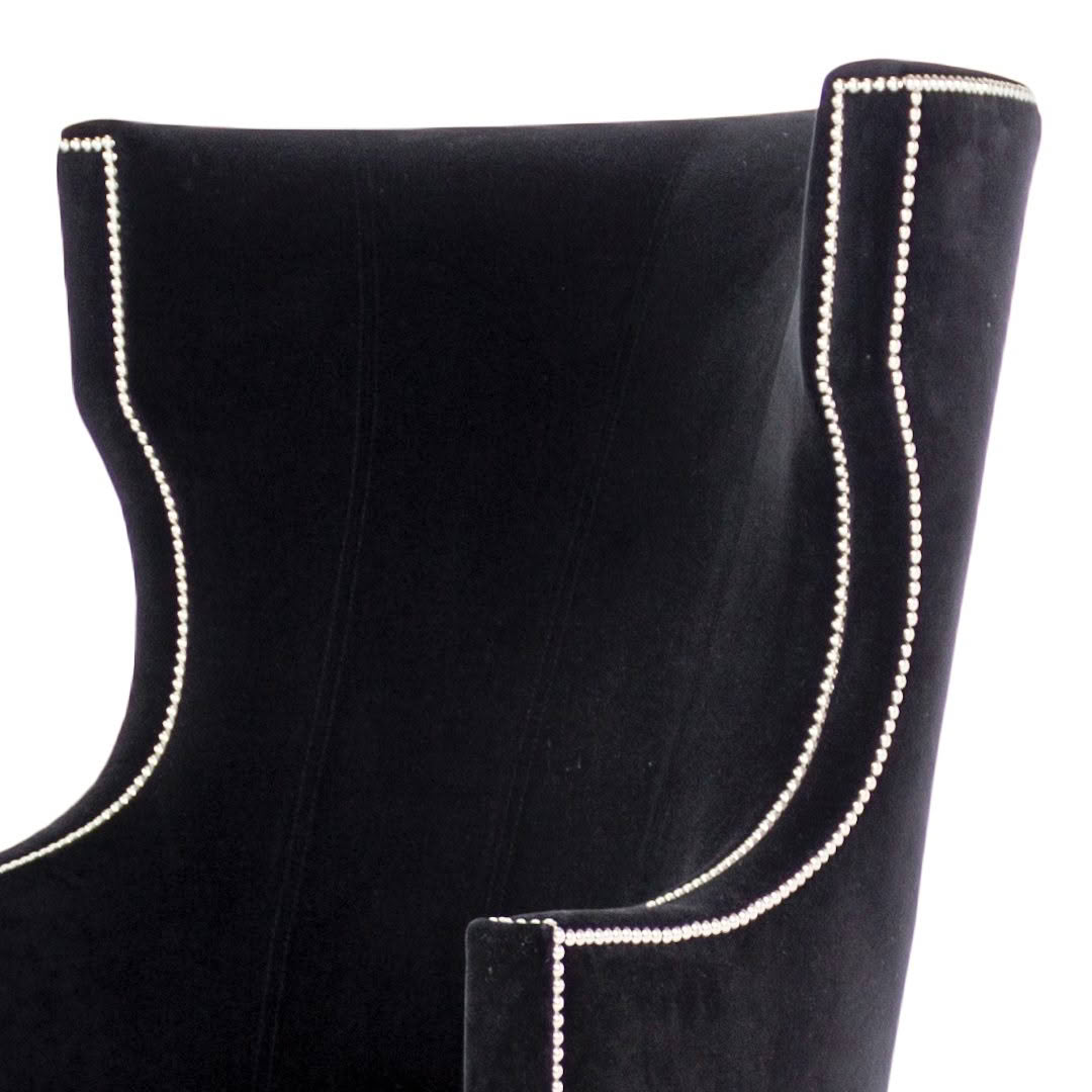 Bordeaux-Armchair_2 Close-up of black velvet chair with silver stud detailing