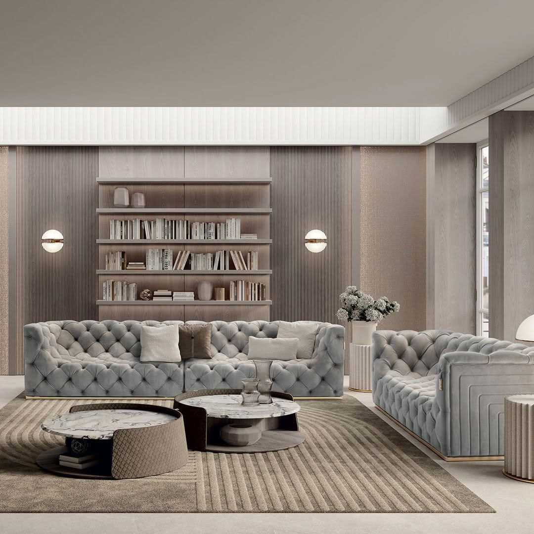 Elegant contemporary living room with plush sofas and bookshelf