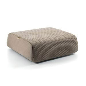 Beige orthopedic pillow on white background