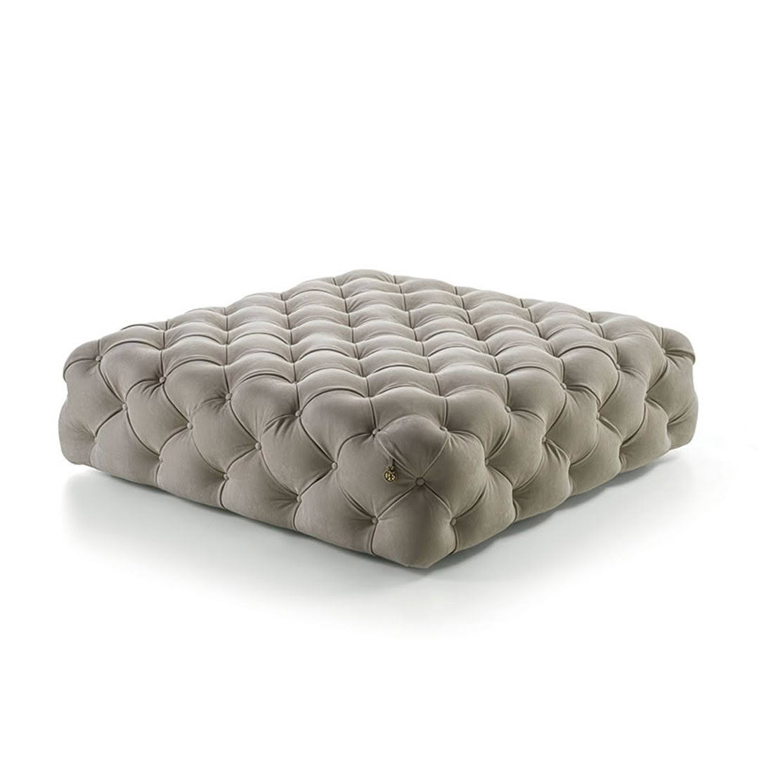 Gray tufted floor cushion isolated on white background