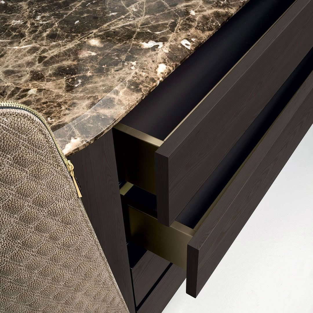 Marble top table with drawer detail and textured purse