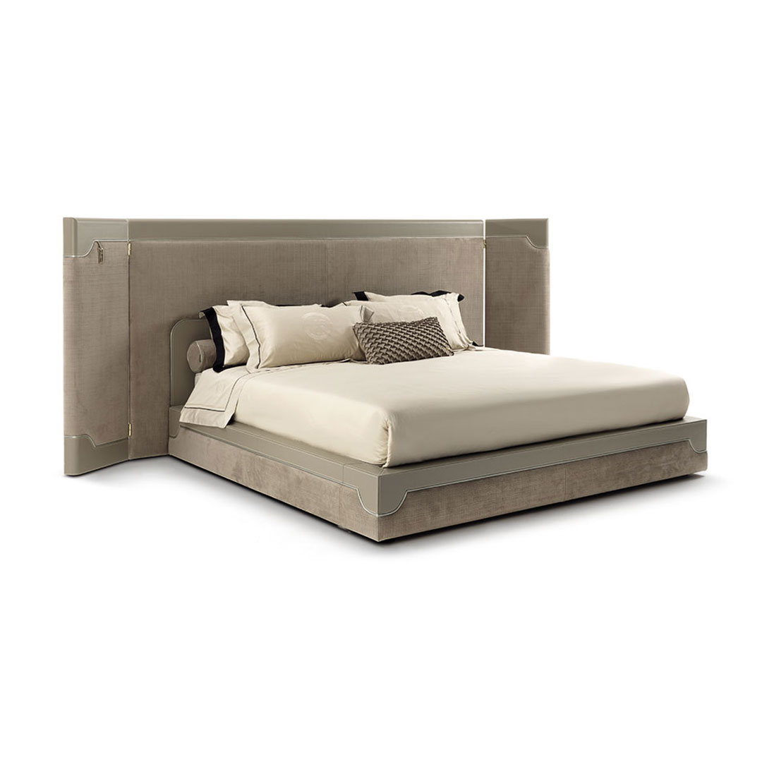 Elegant beige modern king-sized bed with wingback headboard