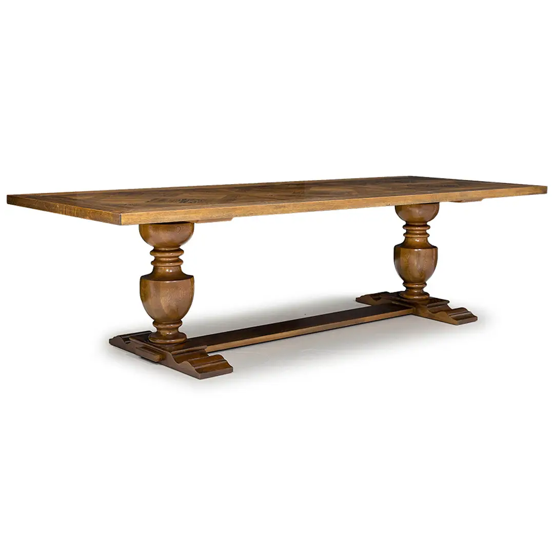 Elegant wooden dining table with ornate pedestal base