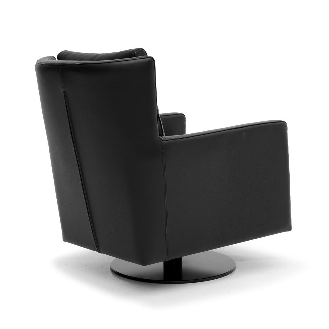 Modern black swivel armchair isolated on white