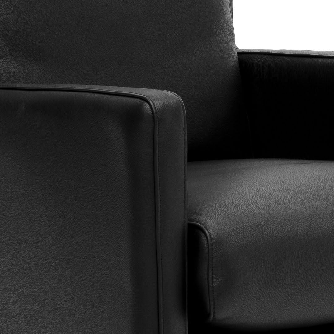 Coupe-swivel-Armchair-3 Close-up of black leather armchair corner