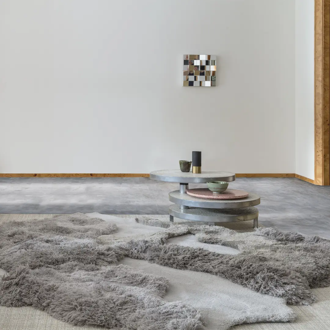 Modern living room with abstract wall art and rug