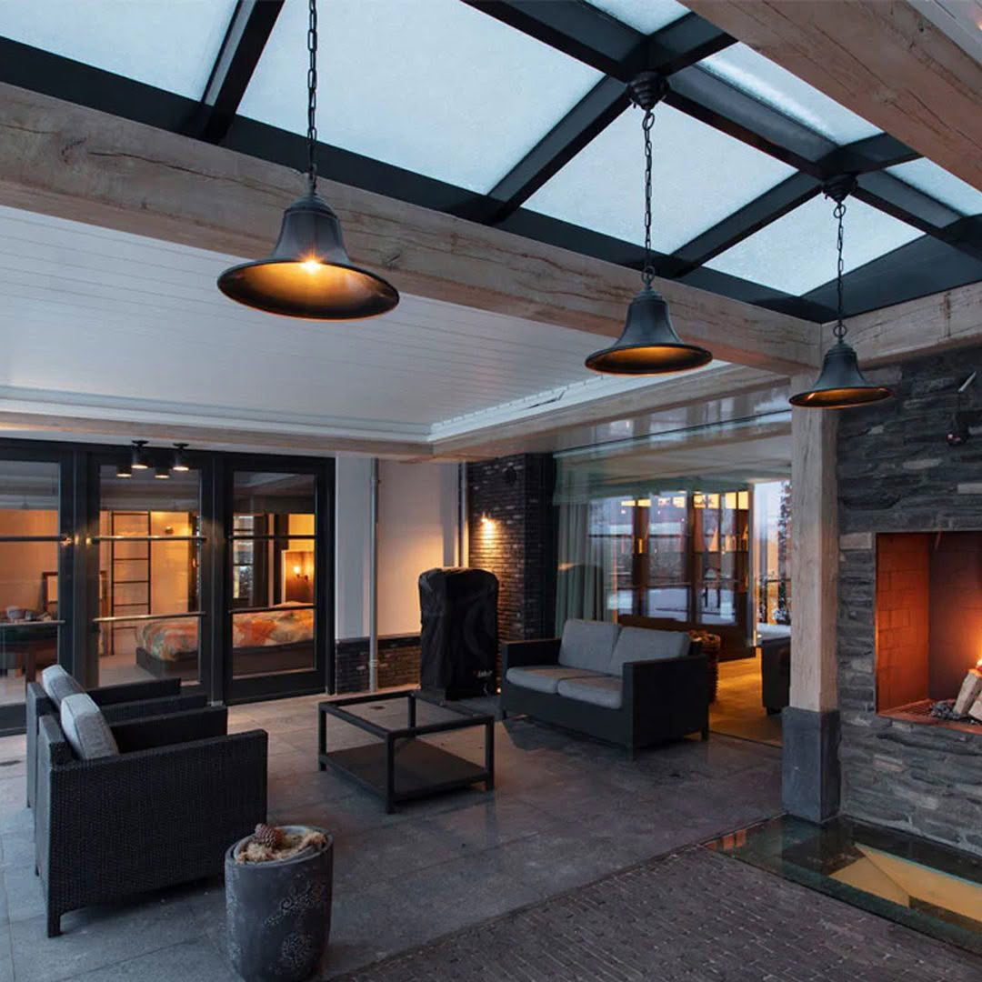 Elegant modern patio with hanging lights and fireplace