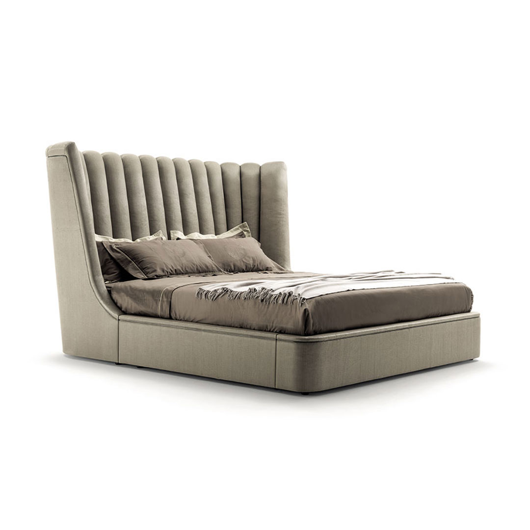 Elegant gray upholstered bed with plush headboard