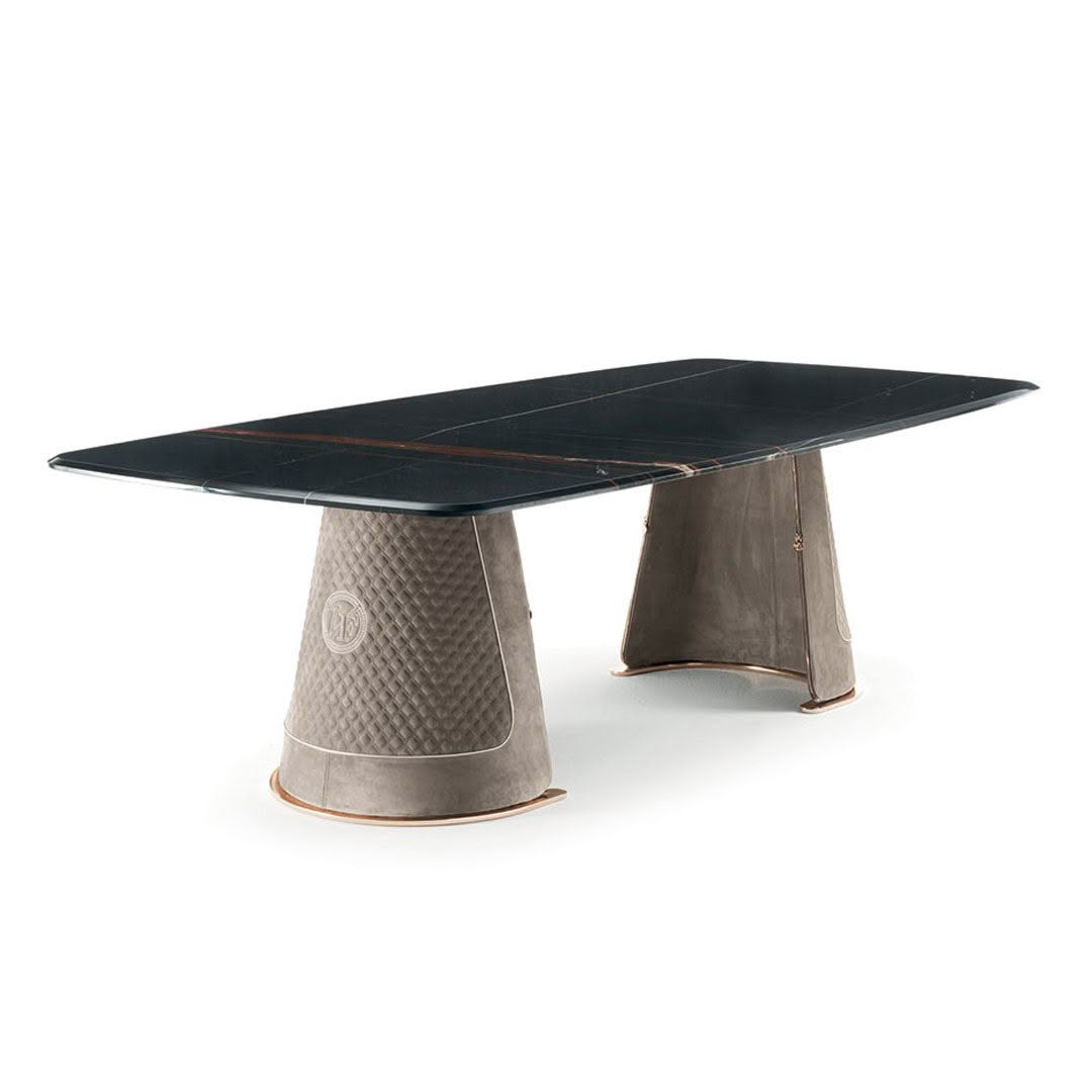 Modern marble table with sculptural metal bases