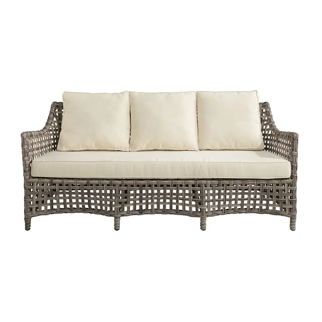 Gray wicker outdoor sofa with beige cushions