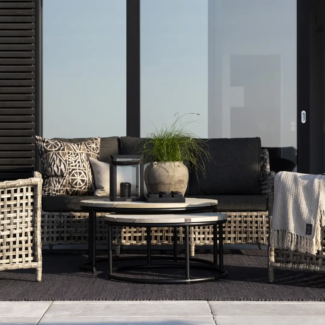 Stylish outdoor patio furniture with decorative pillows