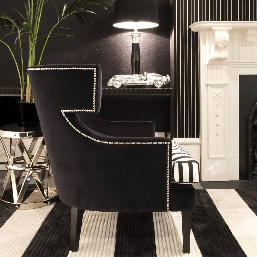 Elegant black chair in stylish monochrome room decor