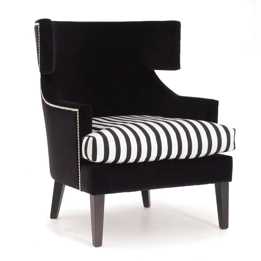 Elegant black velvet high-back chair with striped cushion