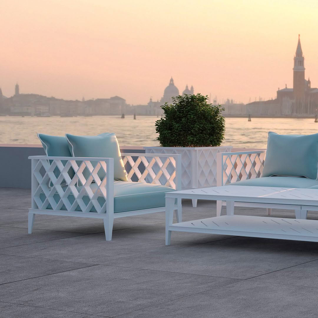 Outdoor furniture overlooking Venice at sunset