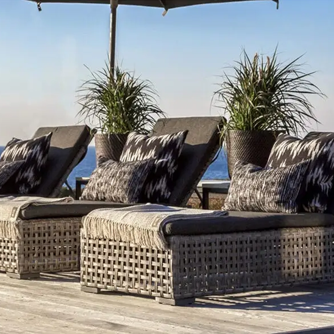 Beachside lounge chairs with ocean view
