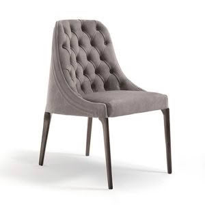 Elegant gray tufted dining chair on white background