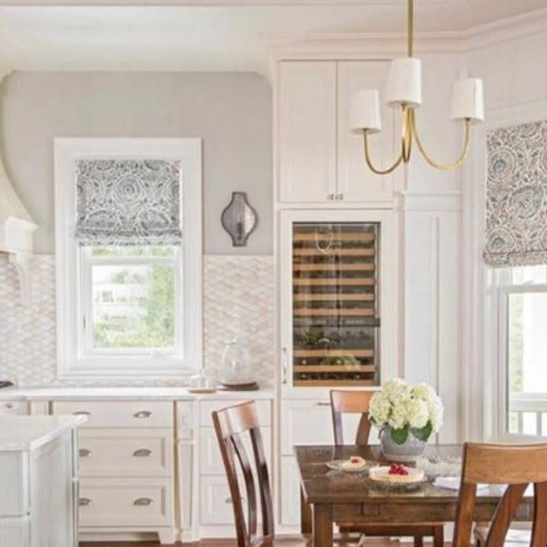 Elegant dining room with chandelier and built-in wine storage