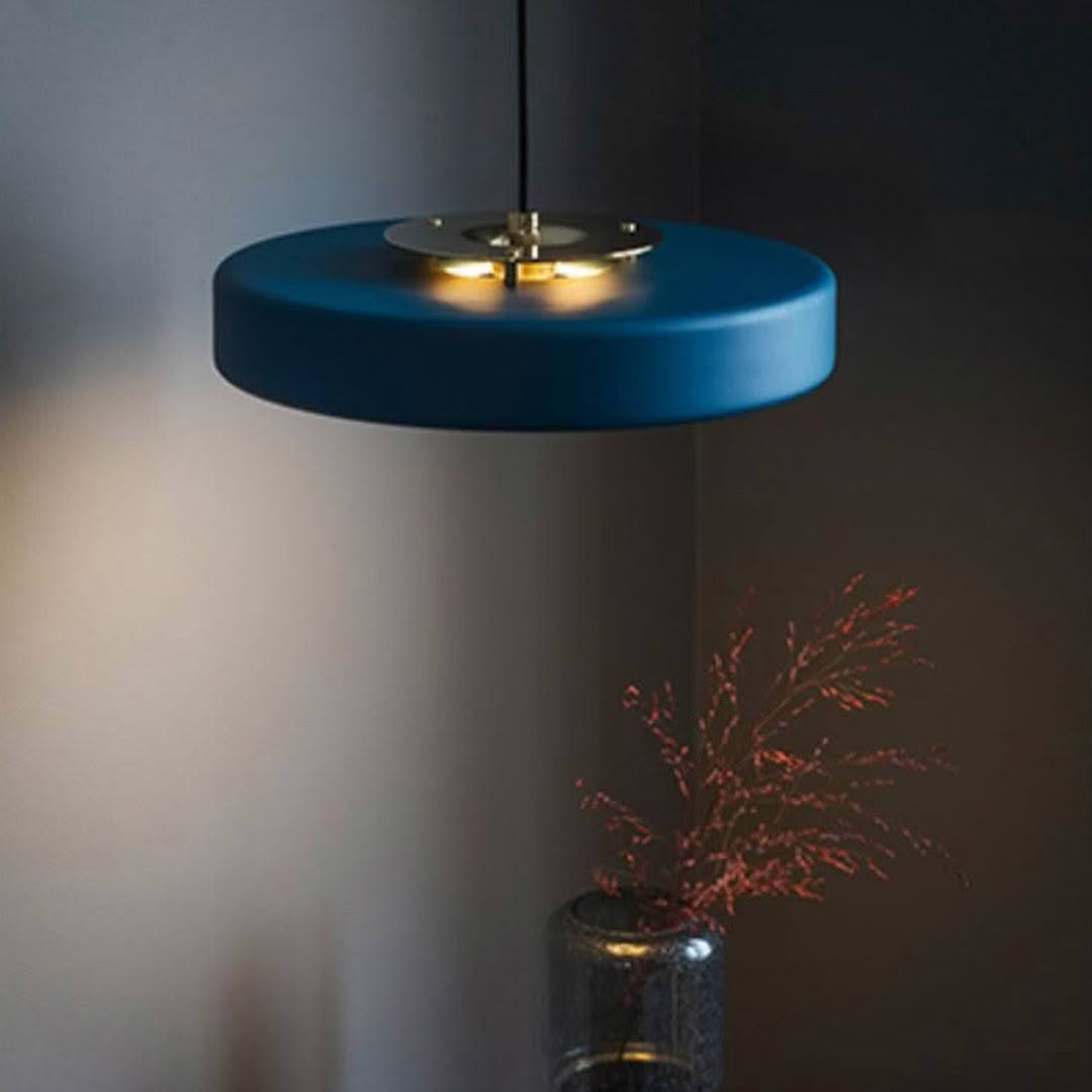 Modern blue pendant light with subtle illumination