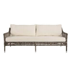Elegant wicker outdoor sofa with beige cushions