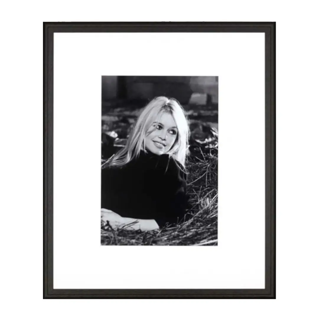 Black and white portrait of smiling woman outdoors