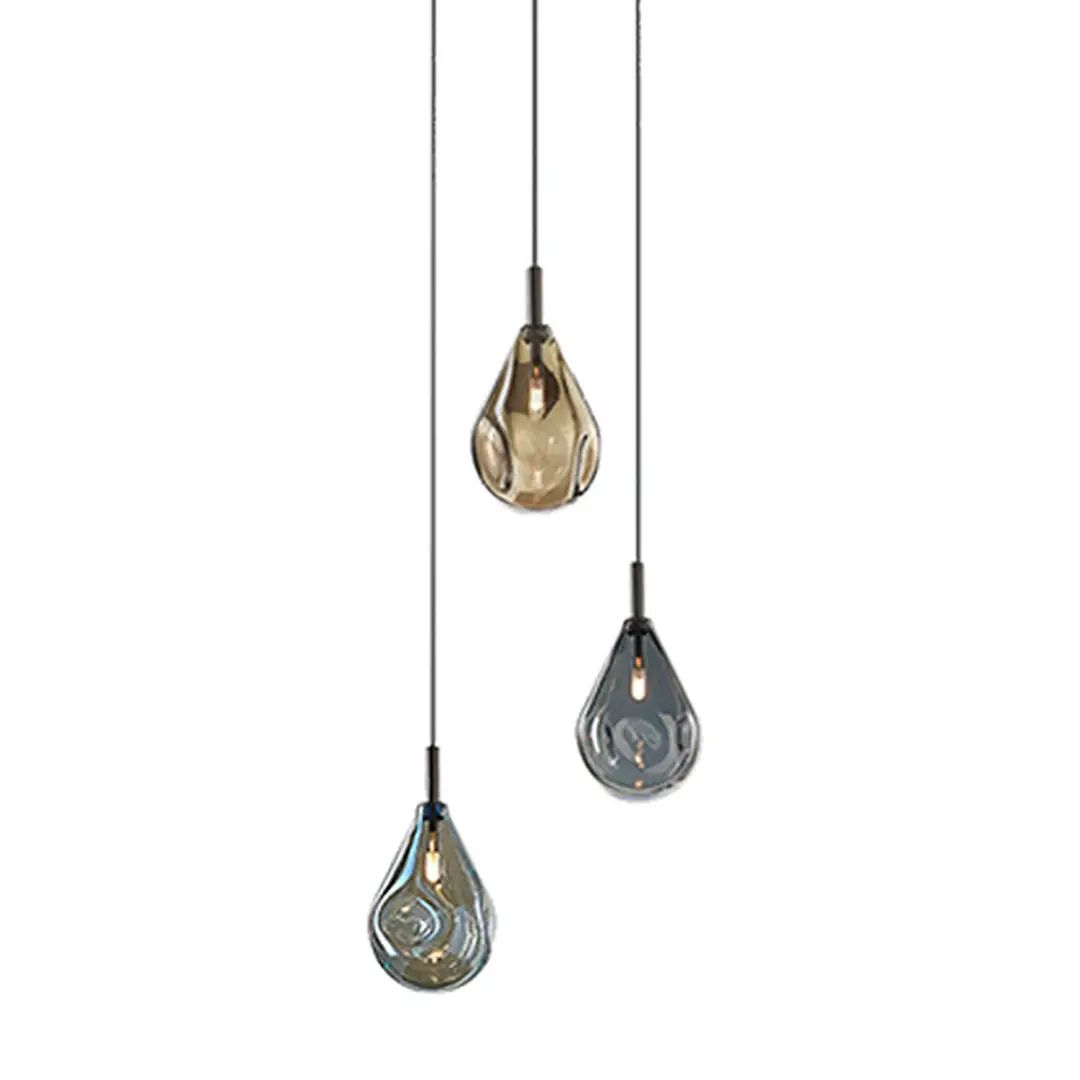 Three tear-drop shaped pendant lights hanging vertically