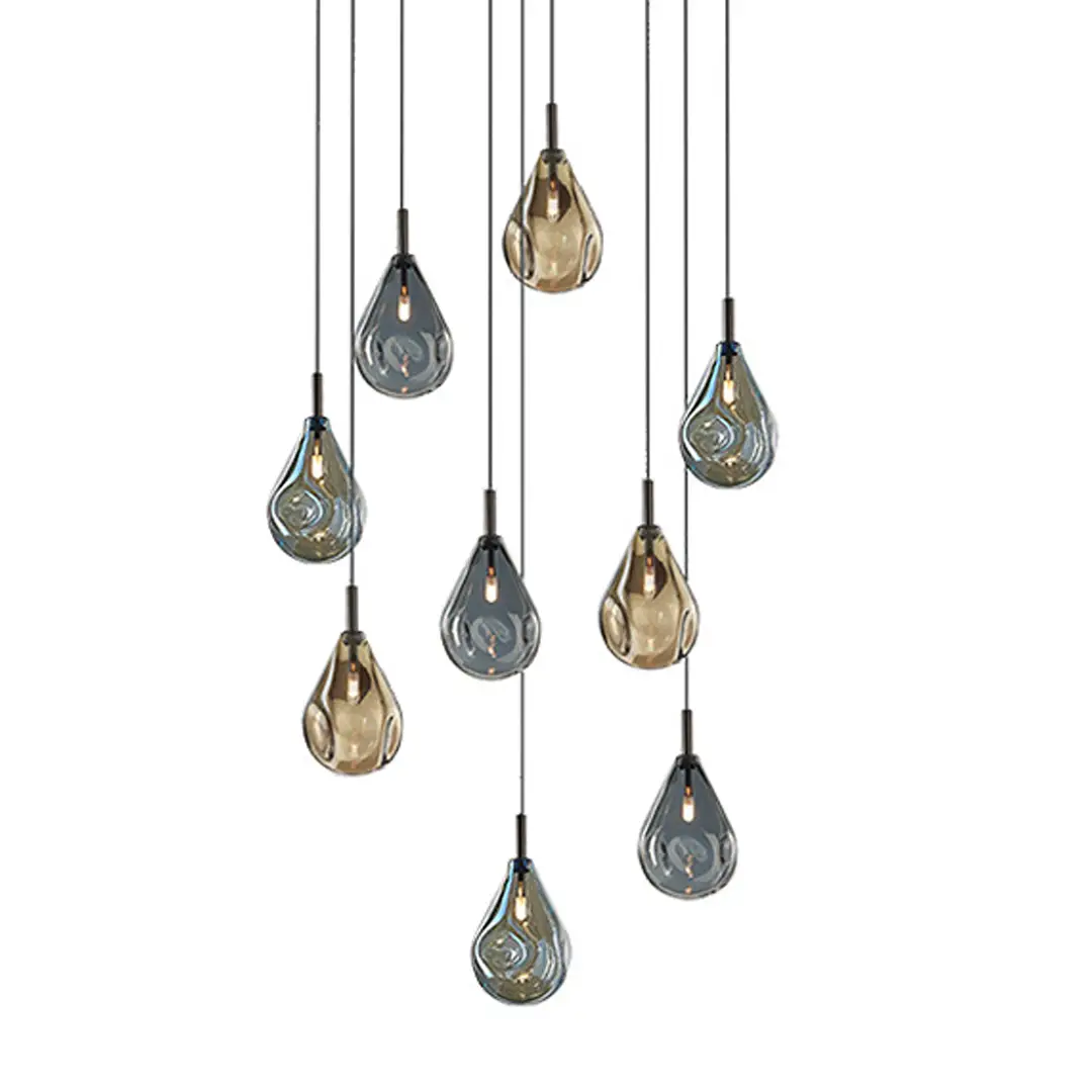 Assorted color teardrop pendant lights hanging in cluster