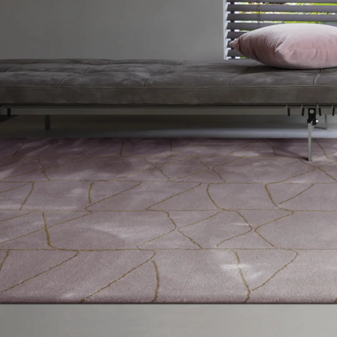 Modern bedroom with elegant pink and gold rug