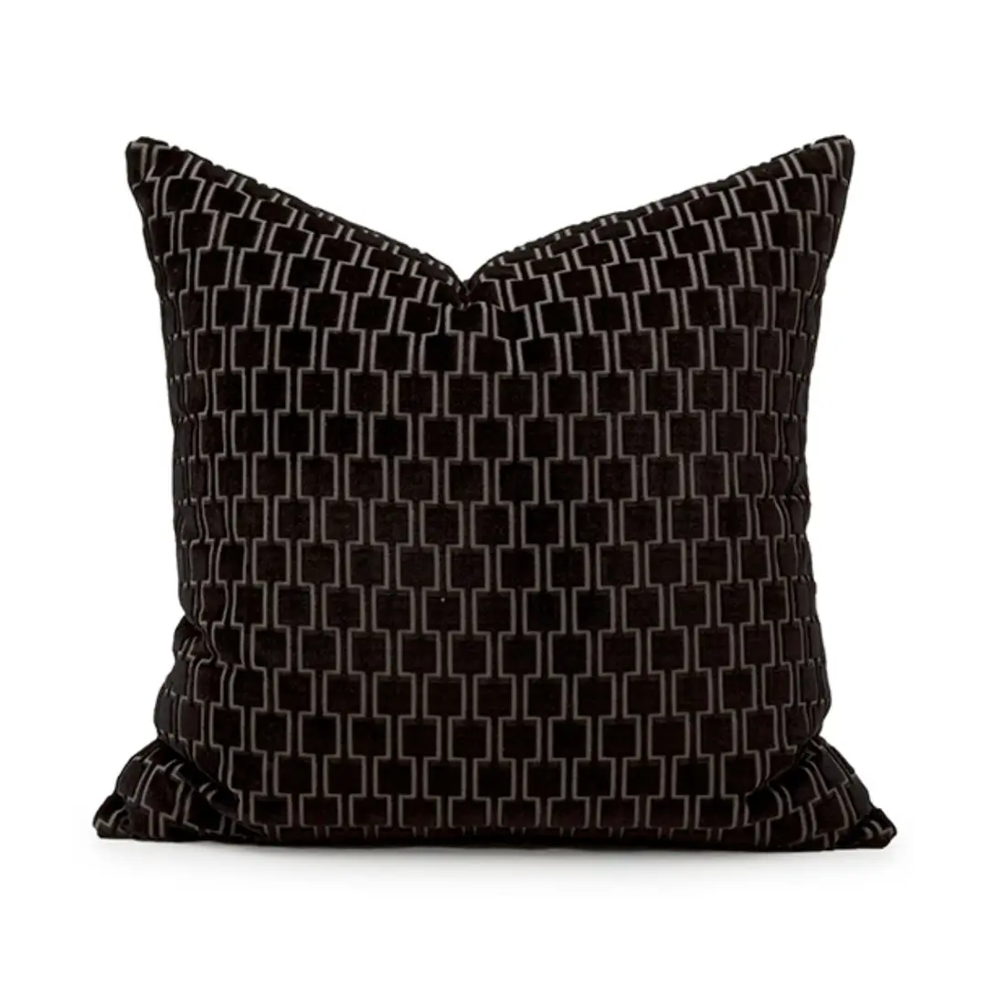 Black decorative pillow with geometric pattern