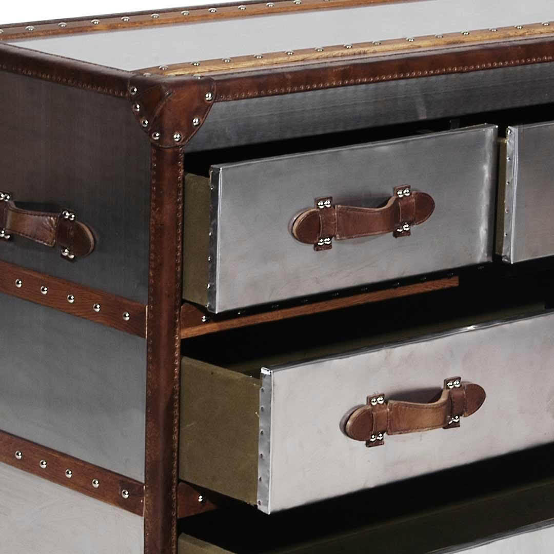 Vintage wooden chest with metal accents and leather handles