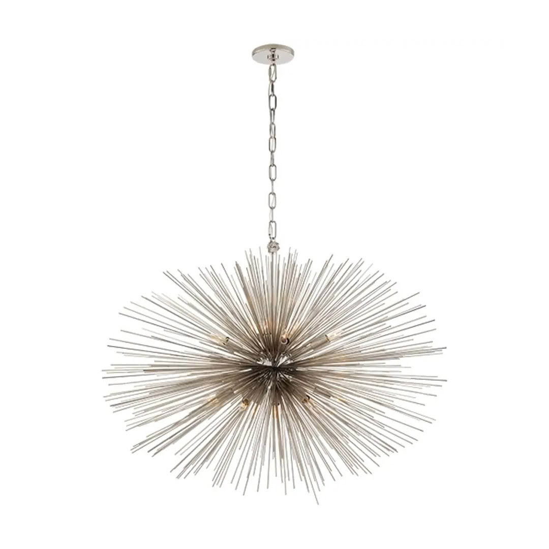 Modern silver starburst chandelier hanging from ceiling