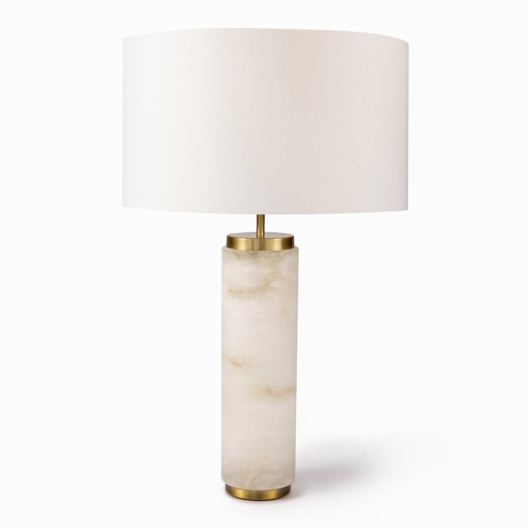 Marble base table lamp with white shade and brass accents