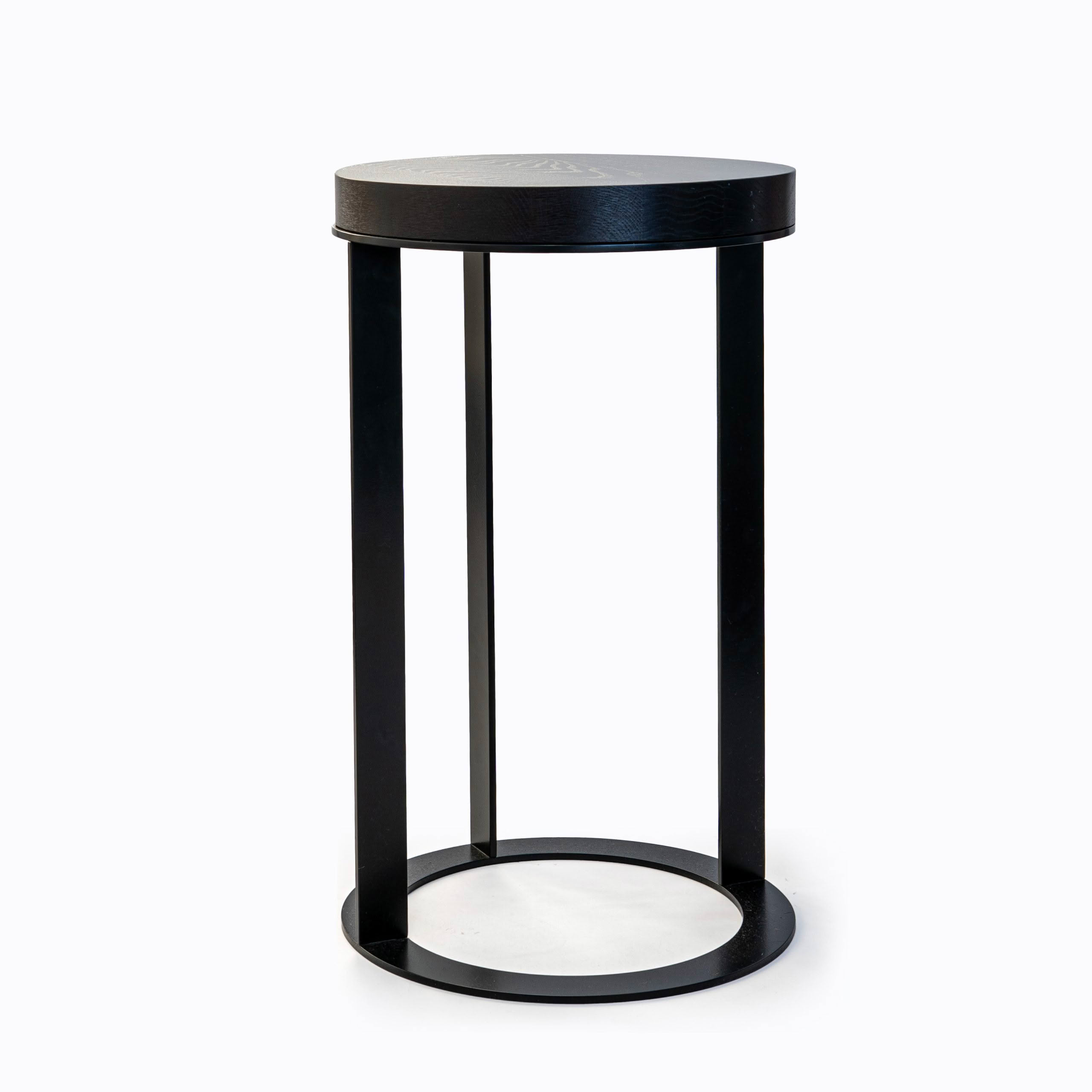 Modern black pedestal table on white background