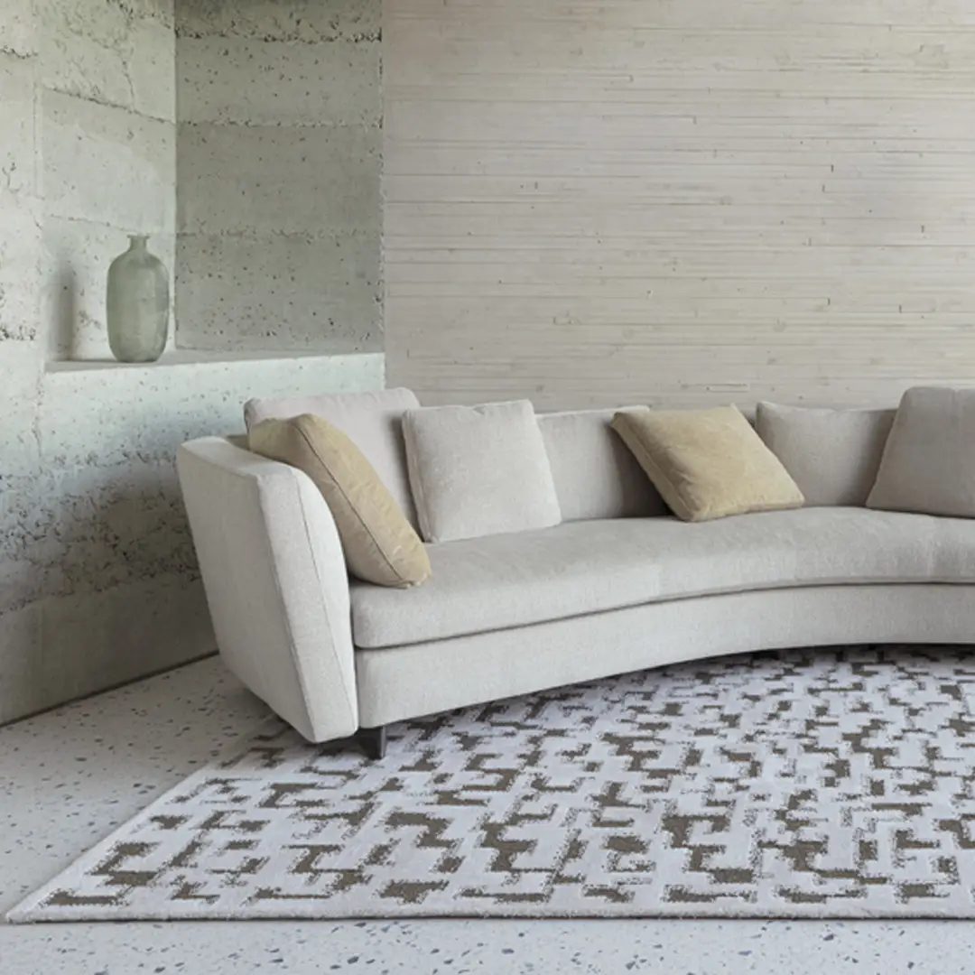 Modern curved sofa in a minimalist living room