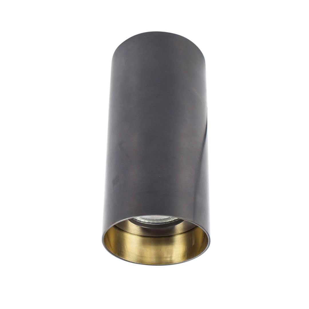 Black cylindrical ceiling light with gold interior