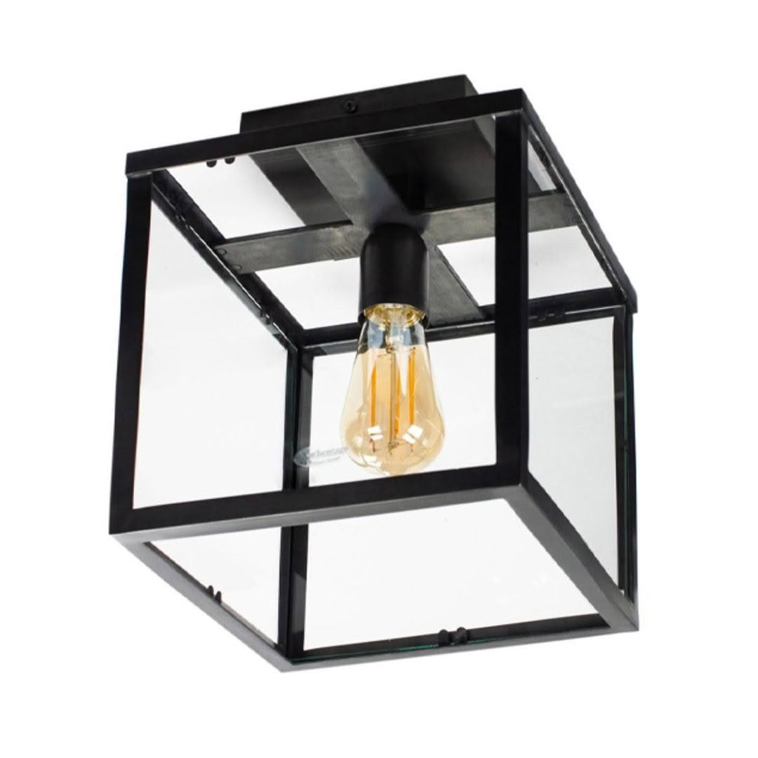 Modern black pendant lamp with illuminated filament bulb