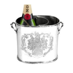 Champagne bottle in engraved silver ice bucket