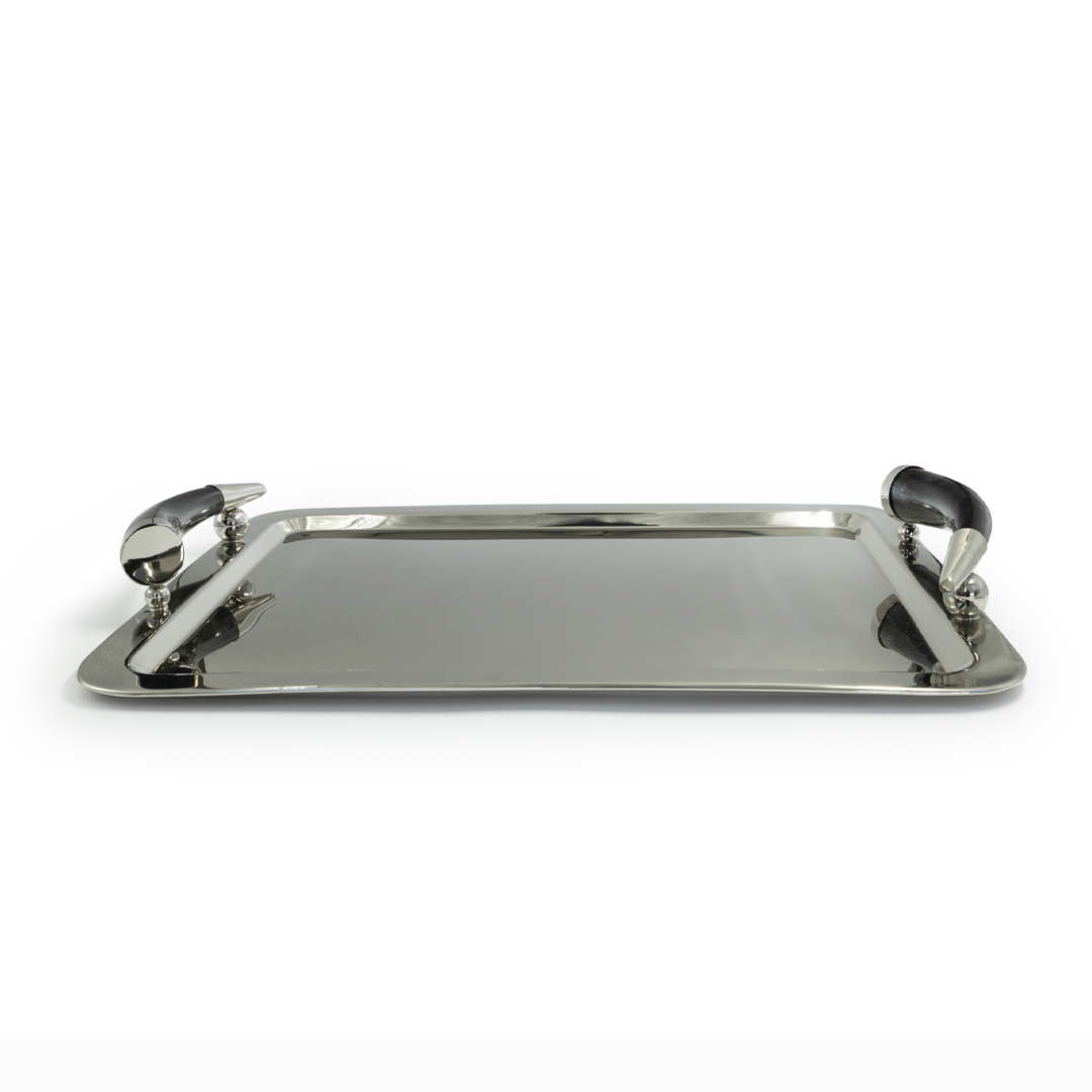 Shiny silver tray with decorative handles