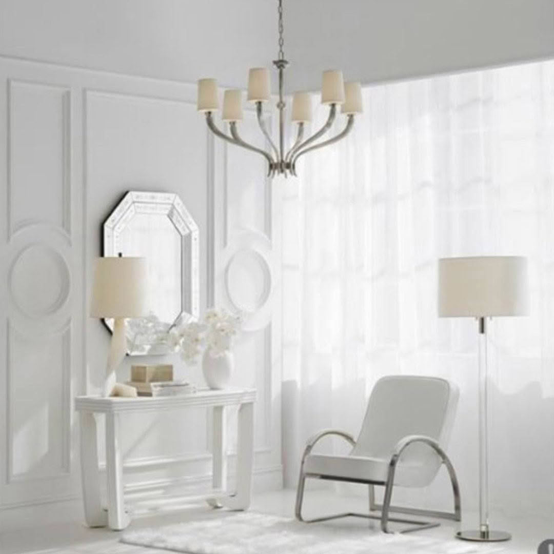 Elegant white living room with chic furniture and decor