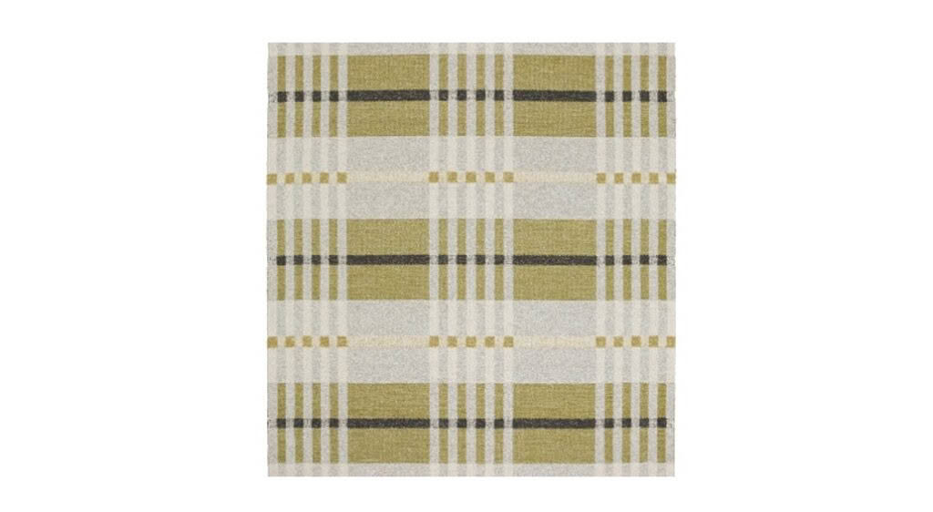 Striped area rug in gray, yellow, and white