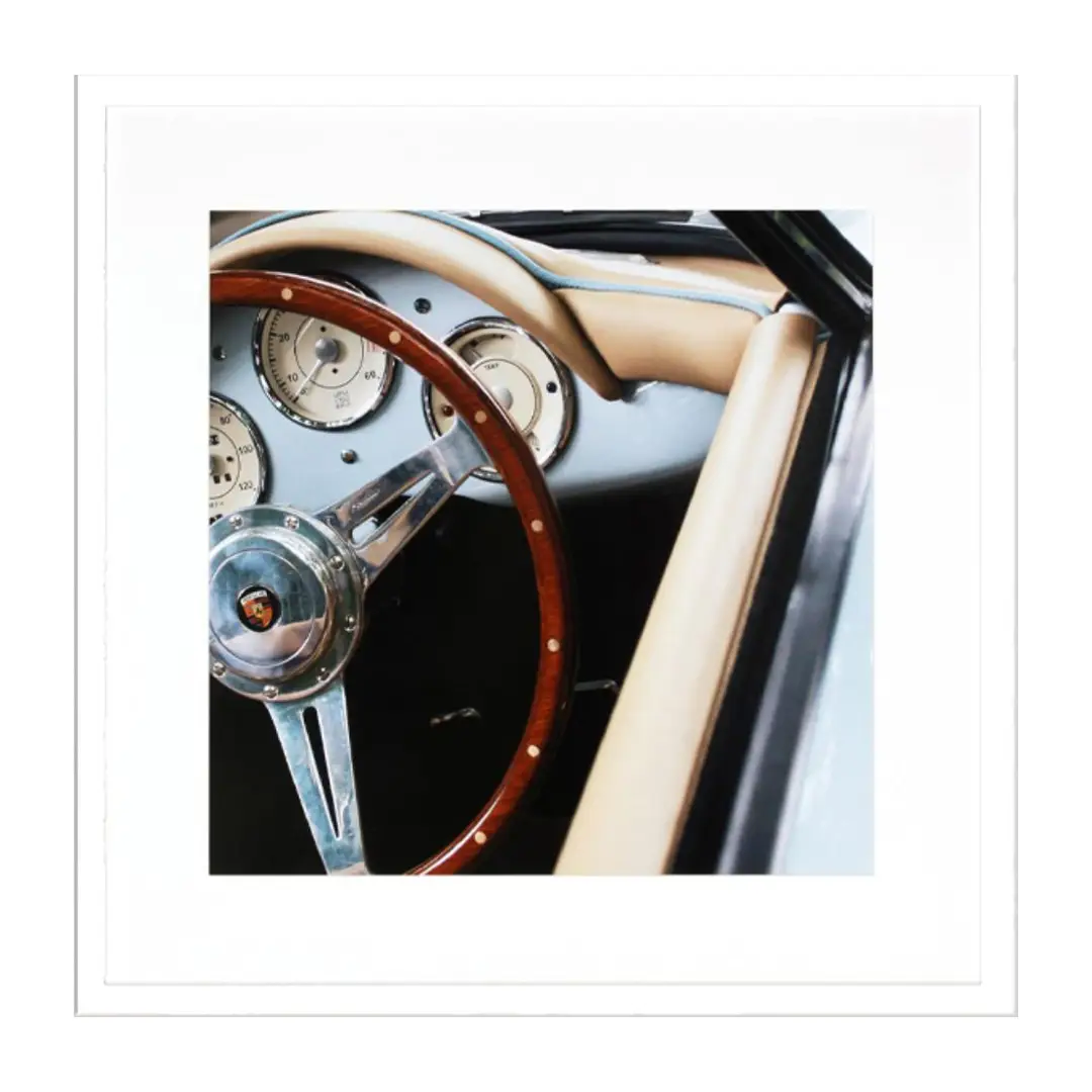 Vintage car dashboard with wooden steering wheel